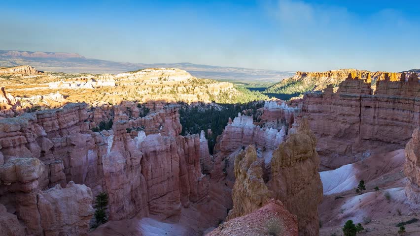 This 4K video shows Bryce Canyon National Park in southern Utah. The visual documents the thousands of sedimentary rock hoodoos and large natural amphitheaters along the eastern side of the Paunsaugunt Plateau. The composition illustrates frost wedging weathering, limestone erosion, and arid geomorphology, documenting western United States physical geography for editorial and environmental media.