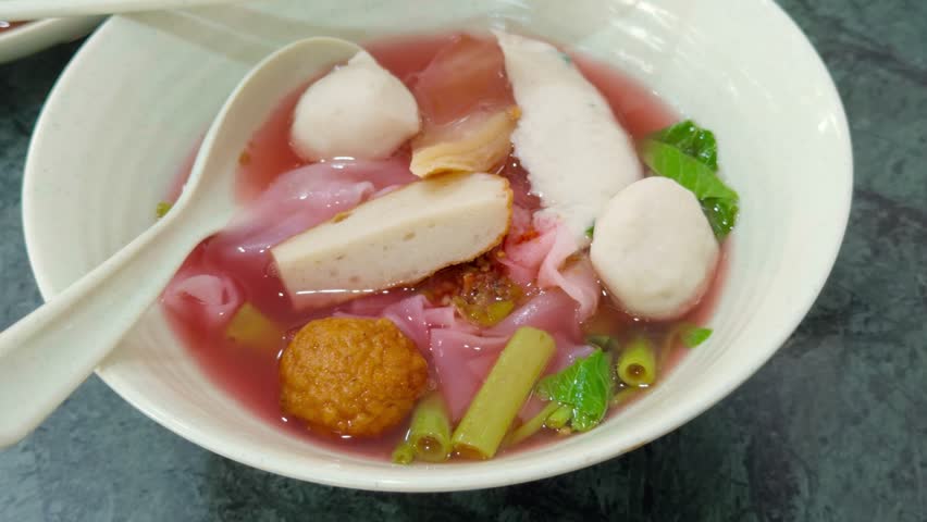 Traditional Thai Pink Noodle Soup Known As Yen Ta Fo With Assorted Fish Balls