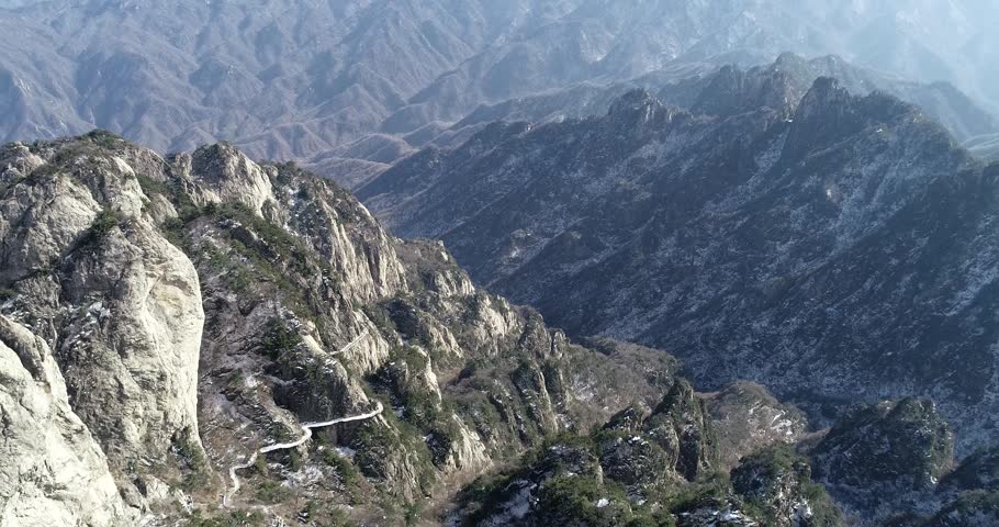 Breathtaking view of the rugged, snowdusted peaks of mount tai