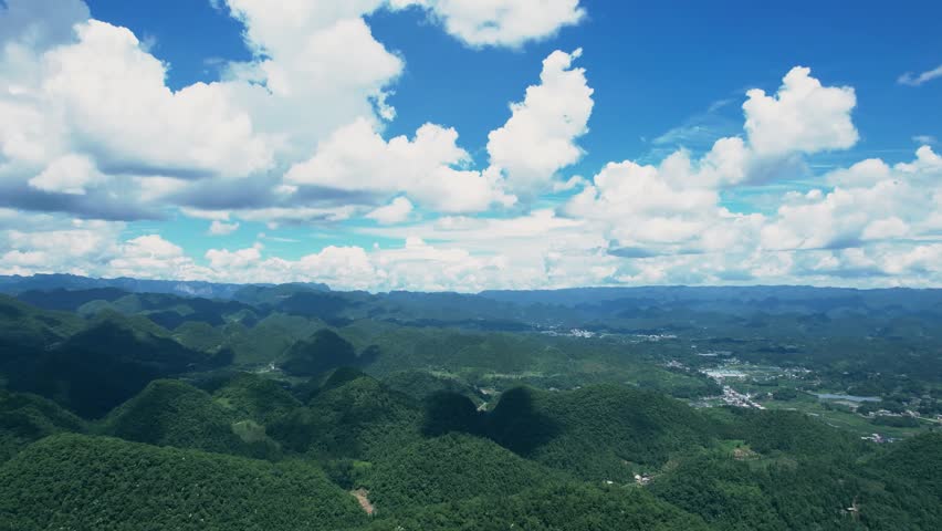 High Mountain Peaks with Dramatic Clouds Views Aerial