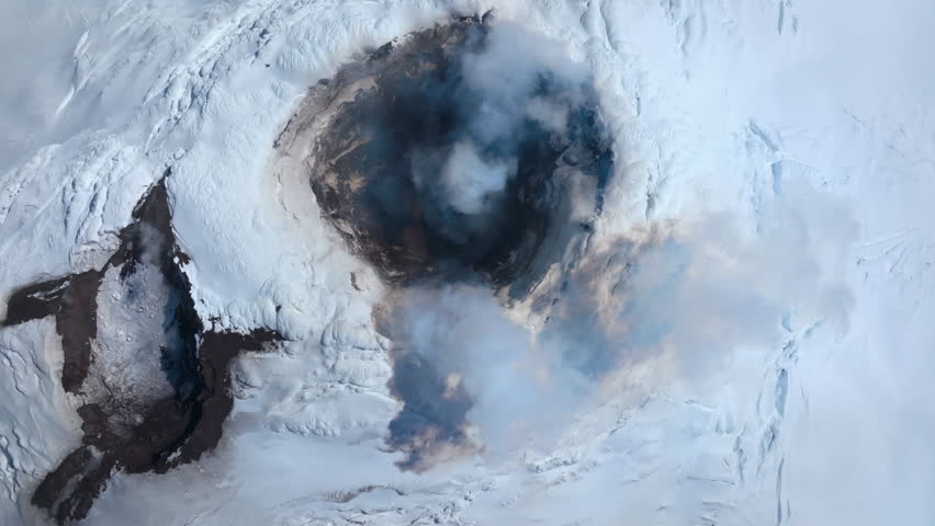 Volcanic crater of Mount Michael smoking
