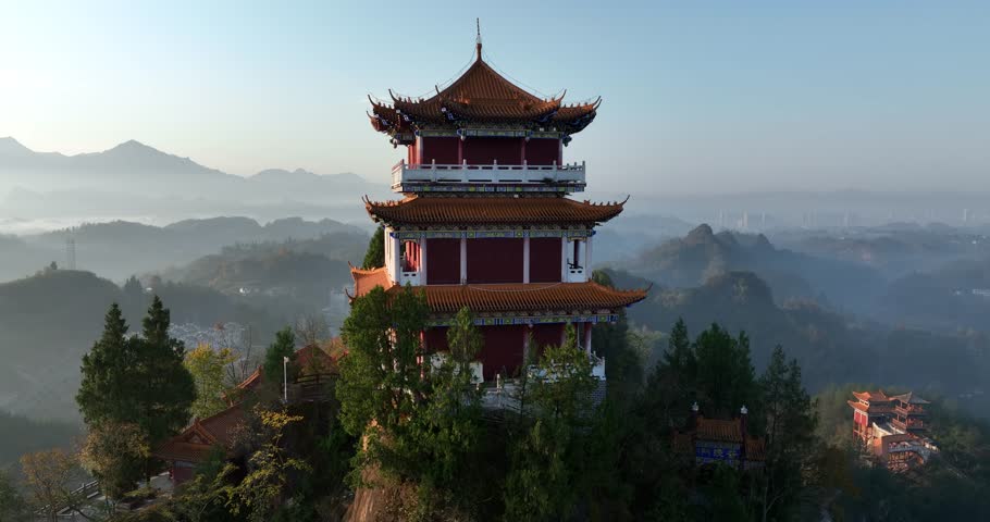 Sunrise and ancient chinese buddha temple landscape in Hunan province,China	