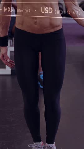 Vertical video: Woman lifting weight after camera rising, finance HUD overlaying and tracking stats. Gym, dumbbell, weights, strength, focus, dynamic, vertical video