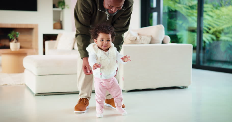 Smile, baby and walking with father in home for first steps, balance support and proud moment. Excited, man and helping toddler for mobility guidance, teaching coordination or milestone encouragement
