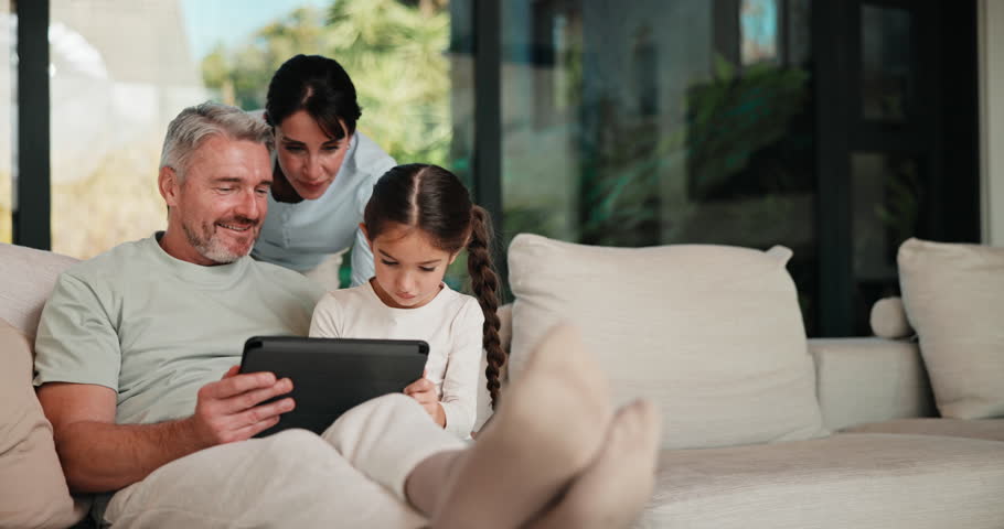 Parents, girl and face with tablet on sofa with smile, bonding and love with streaming in living room. People, mom and dad with child, portrait and application for film subscription at family house