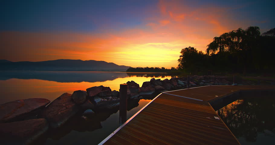 Where the lake preserves the colors of dreams and the dawn awakens them