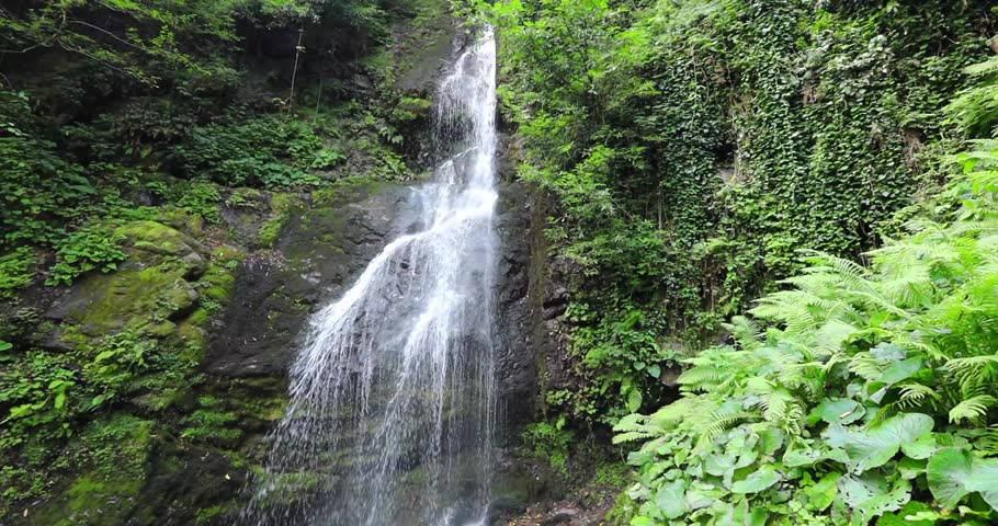 Beautiful mountain waterfall view in the forest of Georgia
