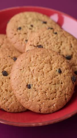 Food, oatmeal chocolate raisin cookies, dessert or breakfast pastry. Oatmeal chocolate cookies as a food background for your design