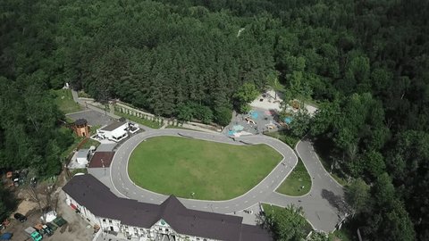 Drone Pulling Back Smoothly over Park Facility