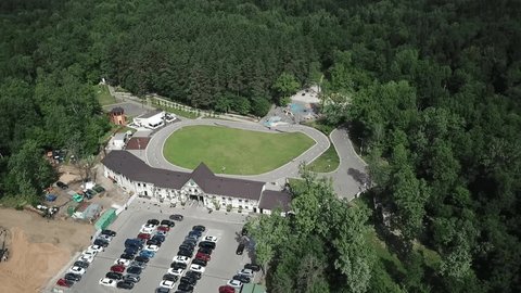 Drone Circling above Park Entrance Complex