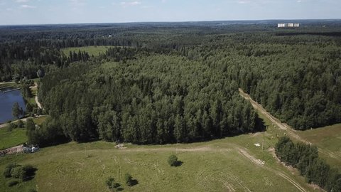 Smooth Backward Drone Flight over Forest Lake