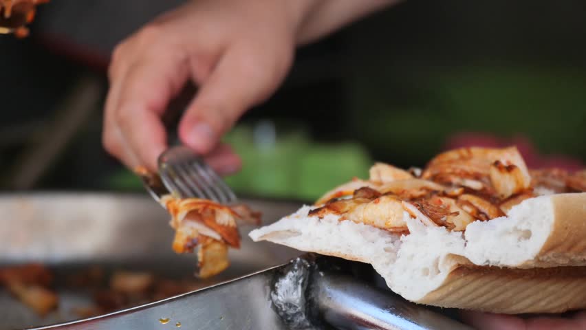 Enjoying flavorful street food at a local market in the city