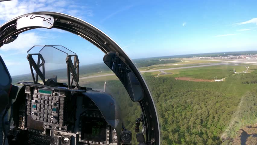 Fighter Jet Cockpit Flying Above Farmland