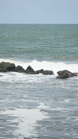 Sea Waves Breaking on Rocks at Uswetakeiyawa Beach, Kandana, Sri Lanka.