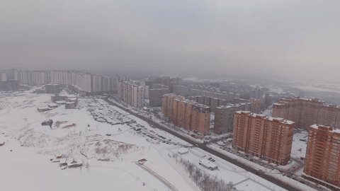 Aerial View of Snowy Winter City Streets