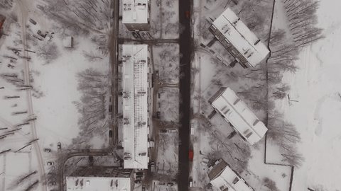 Aerial Drone View Over Snowy City Houses