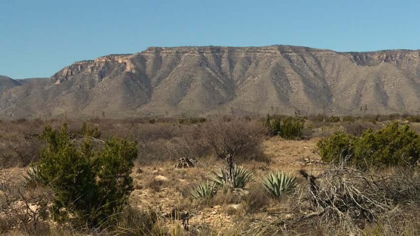 Steep Rocky Cliffs And Dry Mountainside Landscape In Guadalupe Mountains National Park, Texas. Wide Shot