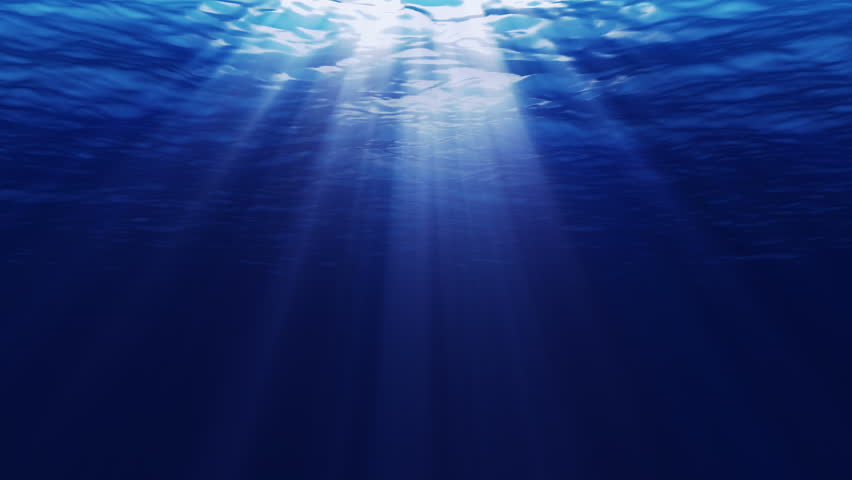 Under water scene with light rays from the sun. HD seamless loop ...