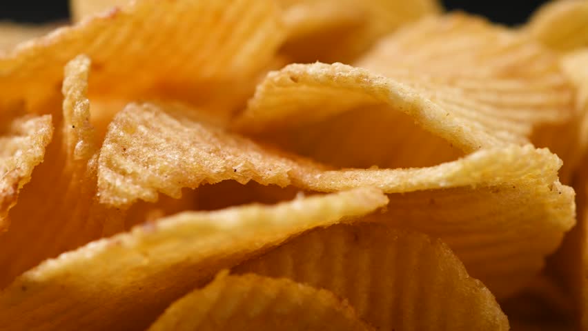 Potato Chips Rotating. Close up