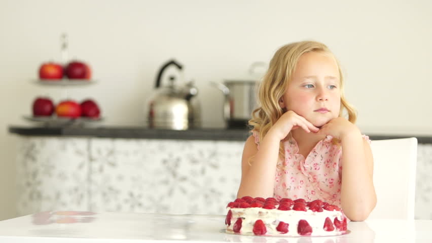 Cute little girl with cake

