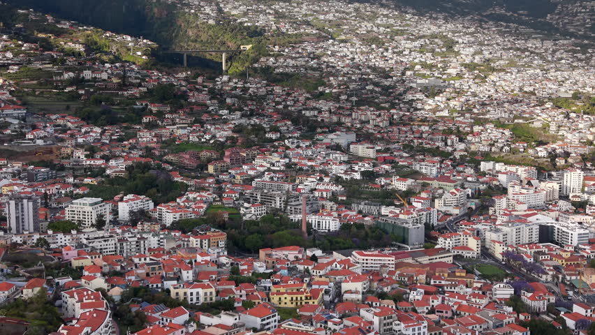 Aerial view of houses and residential buildings in Funchal, Madeira Island, Portugal.
