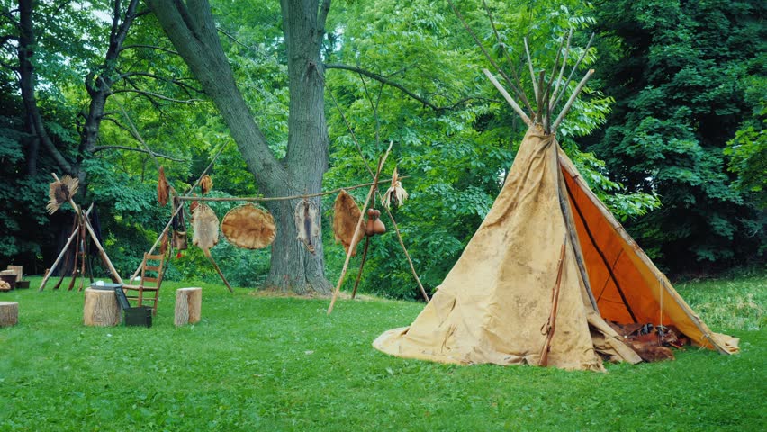 Indigenous camp tipi, furs, vintage, outdoor, nature.