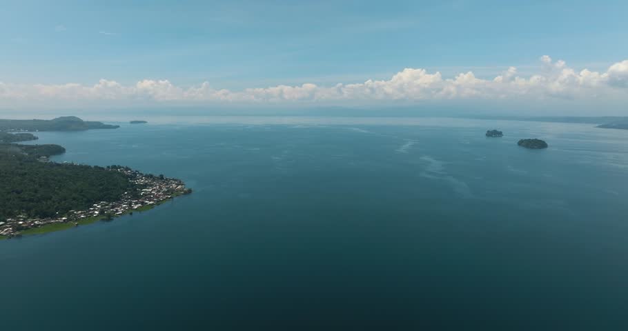 Top view of Lake Lanao with deep water and two small islands. Mindanao, Philippines.