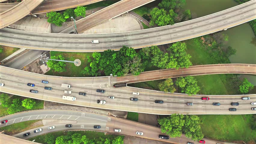 Houston Texas aerial view of highway interchange with curved overpasses and traffic