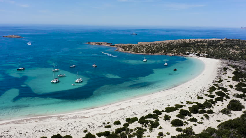 Drone view of famous islet of Espalmador after Ses Illetes beach in the island of Formentera. Spain. 