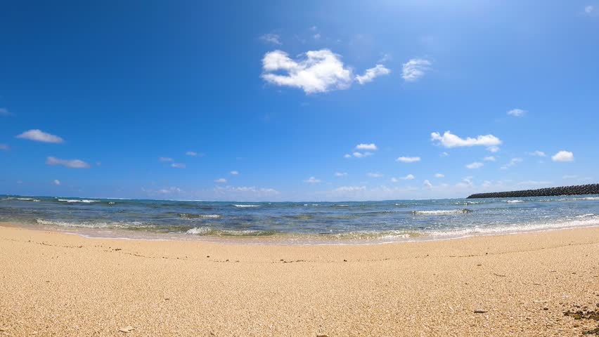 The sound of waves on the sea off Tsuken Island, Okinawa. Senaha Beach, Uruma City, Okinawa Prefecture, Japan.