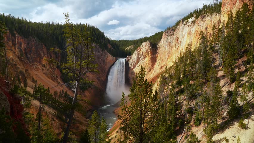 Grand Canyon of the Yellowstone Red Rock Lookout Inspiration Point North Rim Drive Yellowstone National Park Wyoming Yellowstone River cascading waterfalls nature landscape sunny morning clouds pan