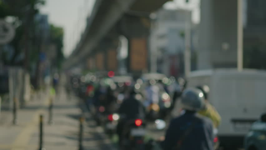 Many vehicles pass by in heavy traffic and are jammed on Jakarta