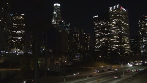 LOS ANGELES - USA, APRIL 2, 2013, Pan right of highway traffic in downtown Los Angeles by night