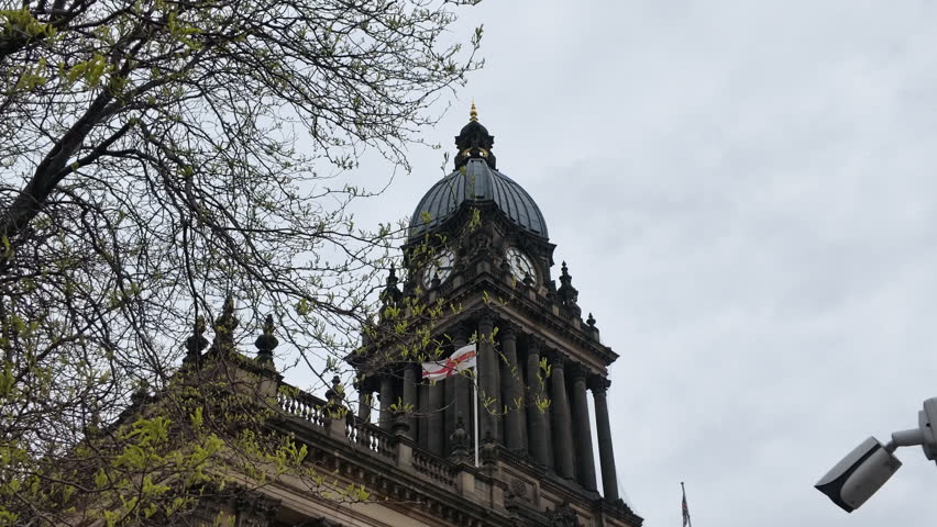 Leeds town hall clock tower with England Flag flying