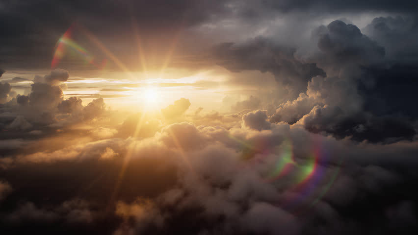Flying above sunset cloudscape panorama, beautiful aerial cloud timelapse, golden sun shines through moving animated cumulus clouds with peaceful god rays, dramatic storm sky.