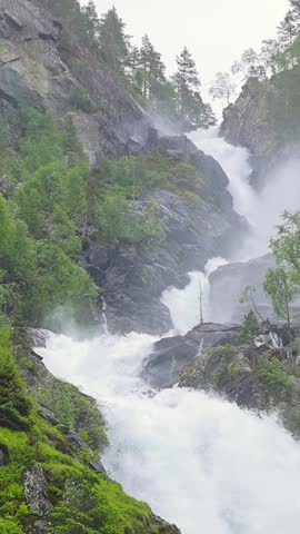 The famous Latefossen waterfall in Norway. Vertical video.