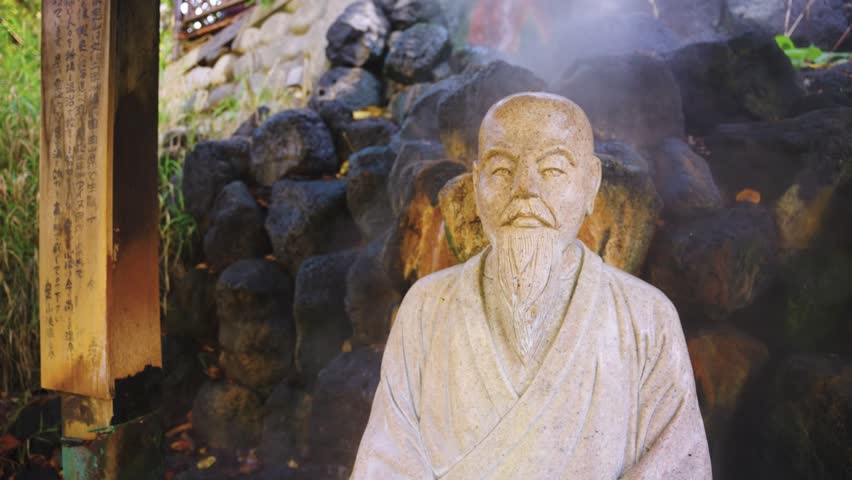 Buddhist Monk Statue in Geothermal Hot Spring Valley, Jozankei Valley