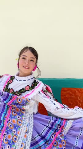 Colombian female dancer showing traditional costume