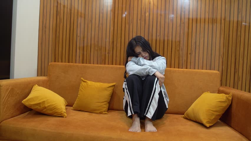 Indian Woman Feeling Depressed and Stressed Sitting Alone at Home