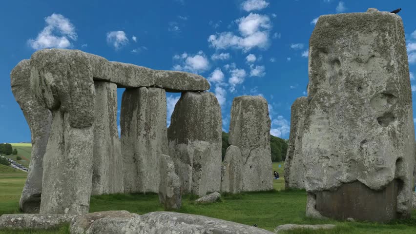 Stonehenge in Wiltshire of England in cloudy weather. It is a prehistoric monument 8 miles north from Salisbury, in the place called Wiltshire in South West England. It is under protection of UNESCO.Drone view of Stonehenge and Wiltshire Countryside in England, UK. The stone circle dates to 3000 BC and is one of the best known ancient wonders of the world and UNESCO World Heritage Site.