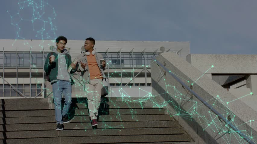 Two men stepping down stairs holding coffee, heading to class while green mesh overlay mapping rail. Students, urban, campus, plaza, notebook, backpack, headphones