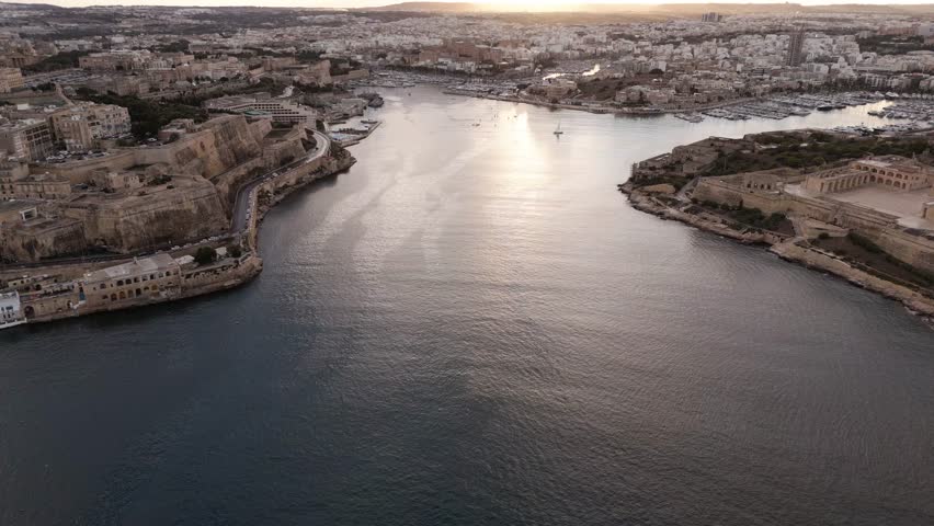 Aerial panoramic view of harbor at sunset