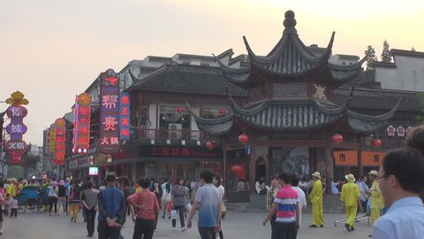 NANJING - CHINA, APRIL30, 2012, Nanjing shopping street crowded at sunset