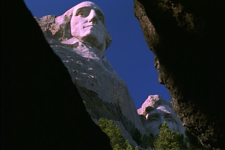  Mount Rushmore as seen through a crevasse below in Keystone, South Dakota.