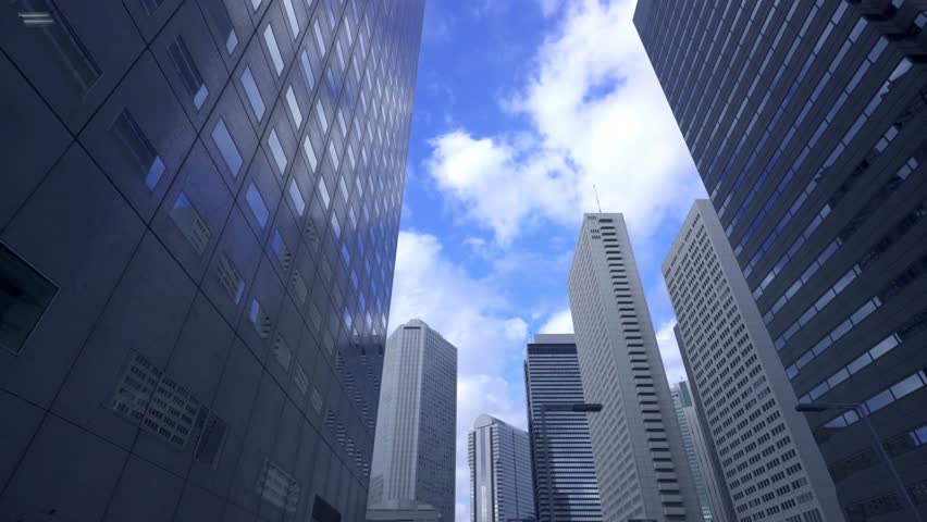 skyscrapers from below Corporate buildings under blue sky low angle view business central district
