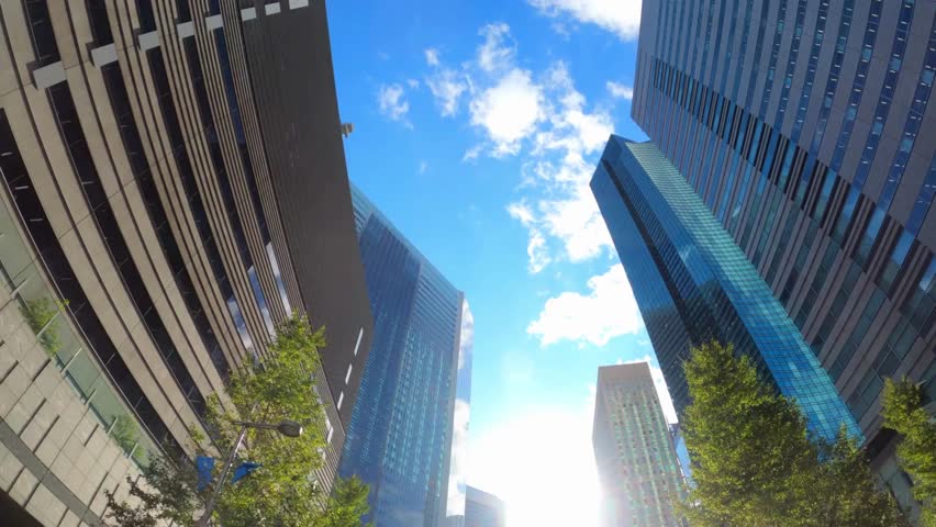 skyscrapers from below Corporate buildings under blue sky low angle view business central district