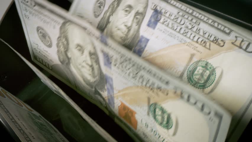 Money counting machine. Currency counting machine counting in slow motion.