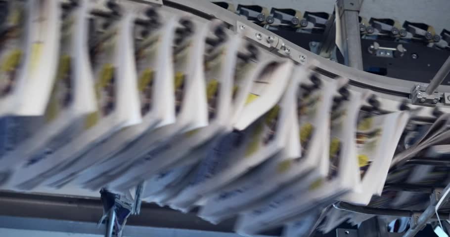 conveyor of printing newspapers in machine news press modern paper print factory