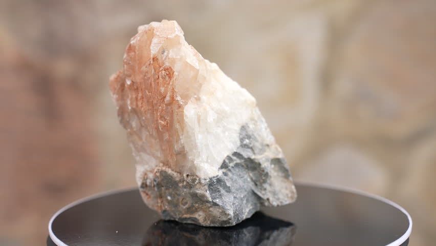 Pink quartz stone, showing its natural crystal texture, soft pink color, mineral surface, and close-up stone details. Suitable for geology videos, wellness content, crystal healing projects, jewelry visuals, product backgrounds, educational productions, lifestyle videos, nature content, and projects related to minerals, gemstones, natural materials, decoration, and spiritual objects.