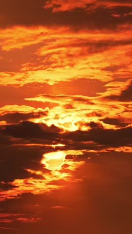 A timelapse of moving clouds at sunset. High quality 4k footage